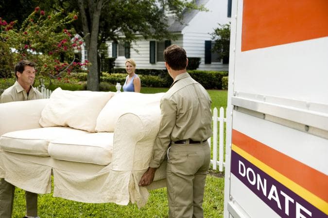 Volunteers loading a donation for delivery.